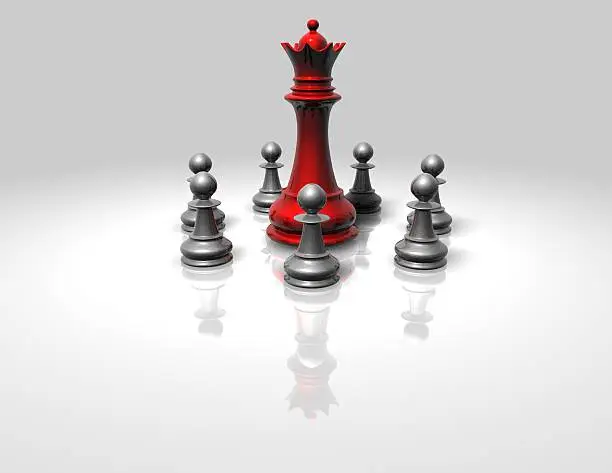 Photo of teamwork concept with chess pawns and queen, isolated illustration
