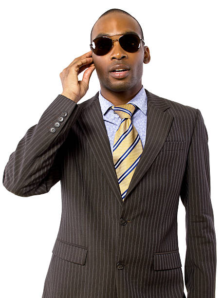 istock Black Bodyguard Wearing a Suit and Sun Glasses 458005347