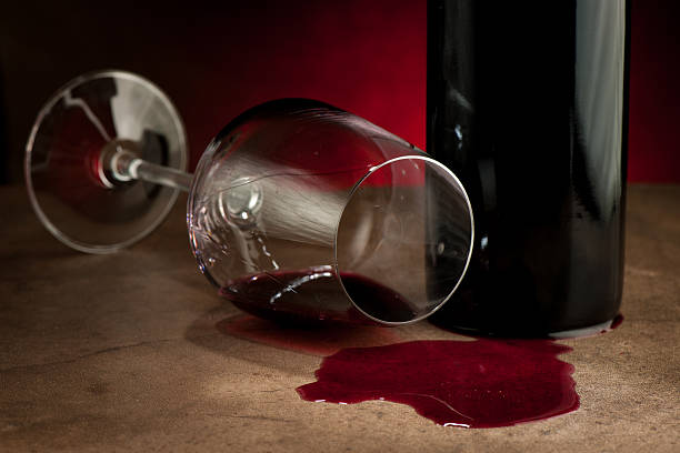 istock tipped glass of wine 458011223