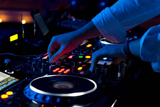 istock Disc jockey mixing music 458021319