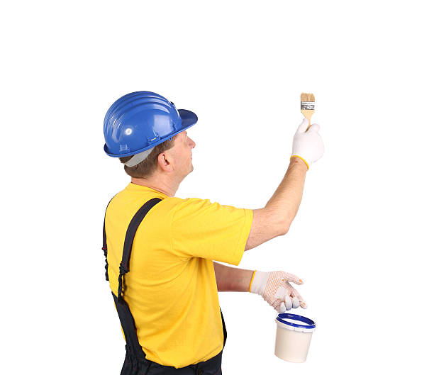 istock Worker holding bucket and brush. 458033387