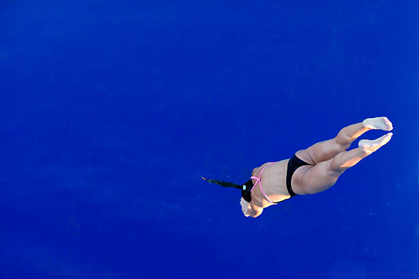 istock Lady diver on the way down 458061345