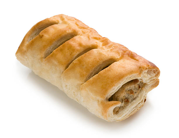 Sausage roll pastry snack with meat on a white background Sausage wrapped in pastry on a white background. sausage roll stock pictures, royalty-free photos & images