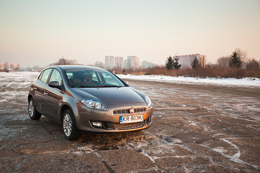 Krakow, Poland - January 29, 2011: Fiat Bravo (second generation) - facelifted model produced in 2010, version: Emotion, color: Epic Gray.