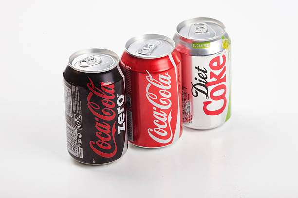 Coke "Sofia, Bulgaria - February 24, 2011: Coca Cola, Coca Cola zero and Diet Coke Can, Studio Shot on white background Bulgarian distribution" coke zero photos stock pictures, royalty-free photos & images