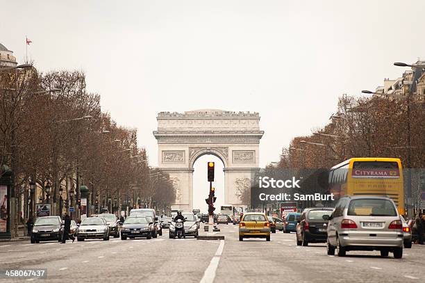 Traffic On The Champs Elysies Stock Photo - Download Image Now - Arc de Triomphe - Paris, Bus, Busy