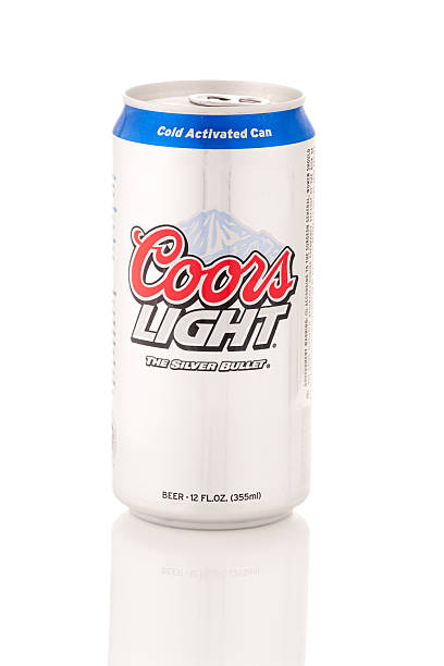 Coors Light beer, 12 oz can, cold indicated blue mountains "Frederick, MD, USA - February 23, 2011: Single can of Coors Light beer, in 12 oz Cold Activated packaging with Wide Vented Mouth. This can is cold, so the mountains on the packaging appear light blue rather than white (their color when warm.) Coors Light is produced by the Coors Brewing Company." Coors Light stock pictures, royalty-free photos & images