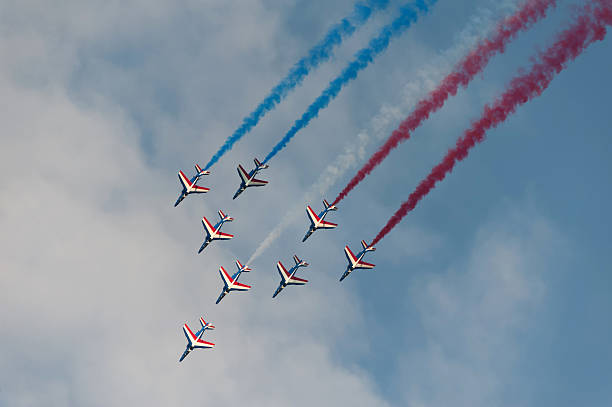 patrouille de france - teamwork flying fighter plane airshow ストックフォトと画像