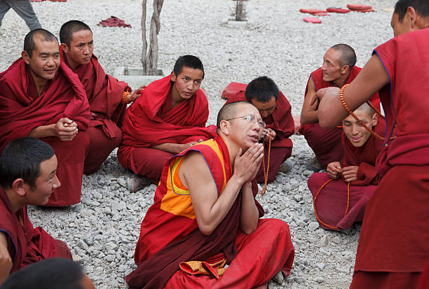 Monks in debate Sera Monastery Lhasa Tibet stock photo