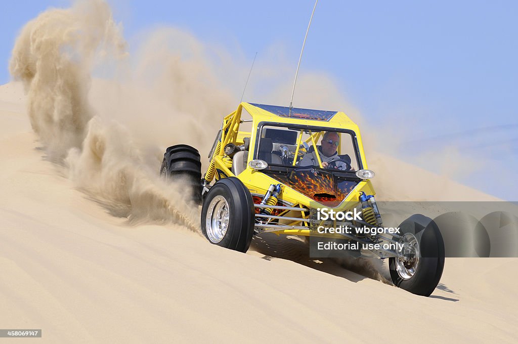 Dune Buggy 2 Yellow Throwing Sand In Turn Stock Photo - Download Now - iStock