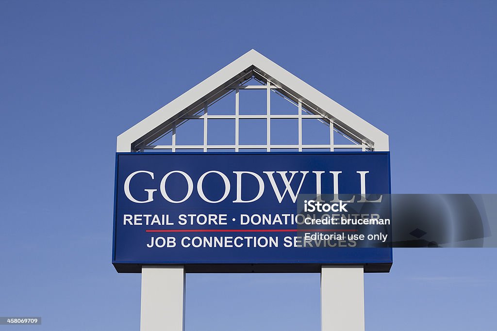 Goodwill Industries Sign "Warrenton, Oregon, USA - September 19, 2011: Goodwill Industries, International, Inc. sign in Warrenton, Oregon in the late afternoon. Goodwill Industries helps people who need to buy cheaper used goods and helps those in need of work with valuable job experience." Store Stock Photo