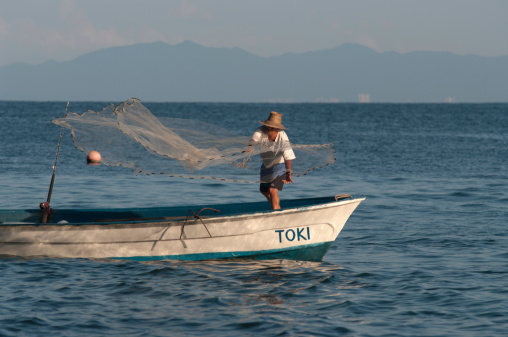 Trawler pulls the net along the Adriatic Sea, Croatia