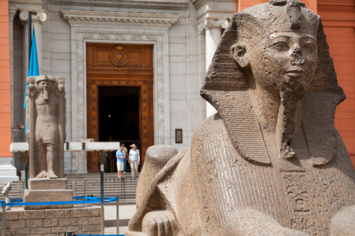 Cairo, Egypt - May 9, 2010:Front courtyard of the Egyptian Museum, home to King Tutankhamen and more than 120,000 other artifacts related to ancient Egypt