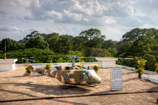 Ho Chi Minh City, Vietnam - July 7, 2011: Copy of the Helicopter of the former president of Vietnam on the rooftop of the Reunification Palace in Ho Chi Minh City, Vietnam