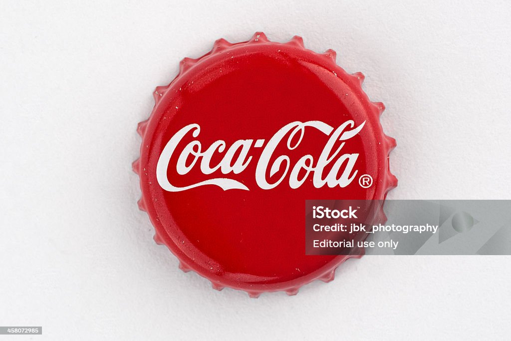 Coca cola bottle cap "Muenster, Germany - September 10, 2011: Coca cola bottle cap" Cola Stock Photo