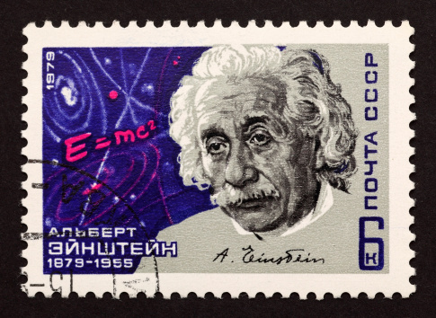 Sacramento, California, USA - March 19, 2011: 1956 Israel postage stamp with a portrait of Albert Einstein to the right of his E=mc2 equation.