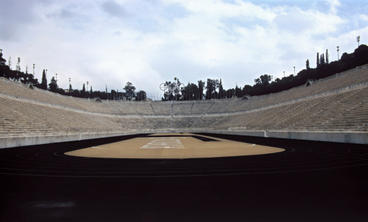 Athens, Greece - April 28th, 2006: View of Panathenaic Stadium. It  is an athletic stadium that hosted the first modern Olympic Games in 1896. Reconstructed from the remains of the ancient Greek stadium, in Athens, Greece.