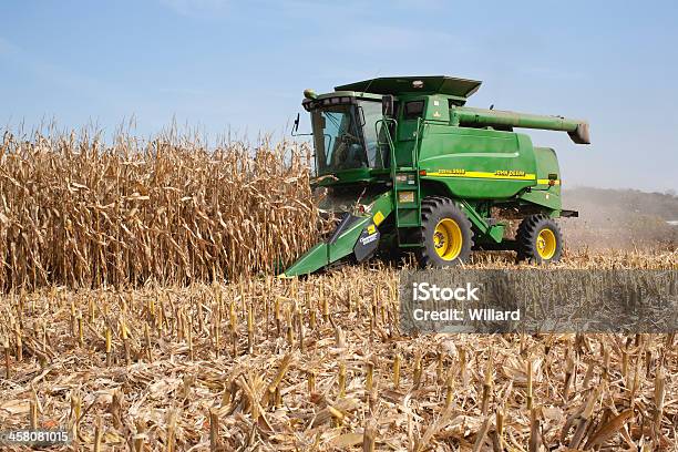 Farmer In A John Deere Combine Harvesting Corn Stock Photo - Download Image Now - Corn - Crop, Harvesting, Crop - Plant