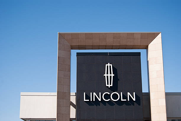 Lincoln Dealership Sign Against Clear Sky stock photo