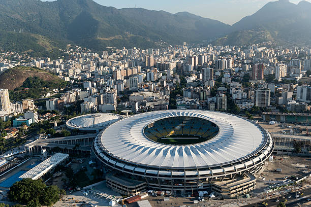 Maracana Stadium "Rio de Janeiro, Brazil - June 6th, 2013: Aerial view of the Maracana soccer stadium and the city of Rio de Janeiro, Brazil.aA" maracanã stadium stock pictures, royalty-free photos & images