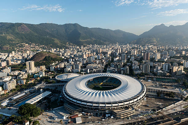 Maracana Stadium "Rio de Janeiro, Brazil - June 6th, 2013: Aerial view of the Maracana soccer stadium and the city of Rio de Janeiro, Brazil.aA" maracanã stadium stock pictures, royalty-free photos & images