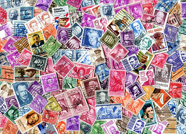 Famous Americans Stamp Background XXXL "Richmond, Virginia - July 13th, 2011:  American Stamps Featuring Famous People Including Civil Rights Leaders, Presidents, And Poets." stamp collecting stock pictures, royalty-free photos & images