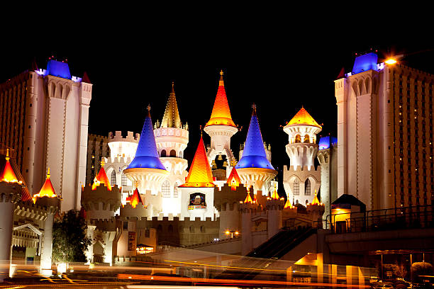 Excalibur hotel casino in Las Vegas at night "Las Vegas, Nevada, USA - February 21, 2011: Excalibur hotel and casino in Las Vegas at night. The Excalibur is located on the Las Vegas Strip. Excalibur, named for the mythical sword of King Arthur, uses the Arthurian theme in several ways. Its facade is a stylized image of a castle. It is owned and operated by MGM Resorts International." excalibur stock pictures, royalty-free photos & images