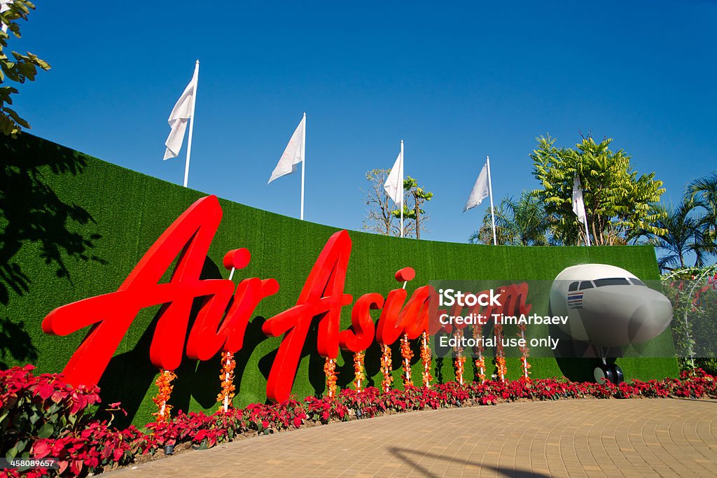 AirAsia on the exhibition "Chiang Mai, Thailand - 16 January, 2012: Exposition of low-cost airline ""AirAsia"" at Royal Flora Ratchaphruek Exhibition. This is a huge exhibition complex about many kinds of plants." Advertisement Stock Photo