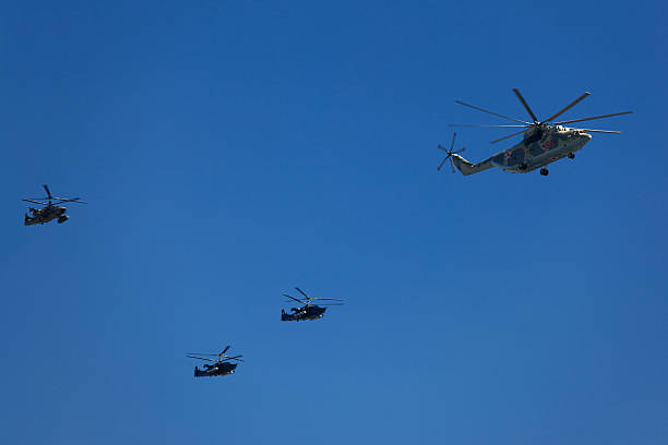 Moscow, Russia - May, 05, 2021: Mi-35M attack helicopters in the sky over Moscow during the parade dedicated to the anniversary of Victory in the Great Patriotic War.