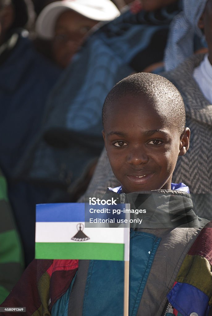 Junge Lesother mit Lesotho flag der King's Birthday - Lizenzfrei Afrika Stock-Foto