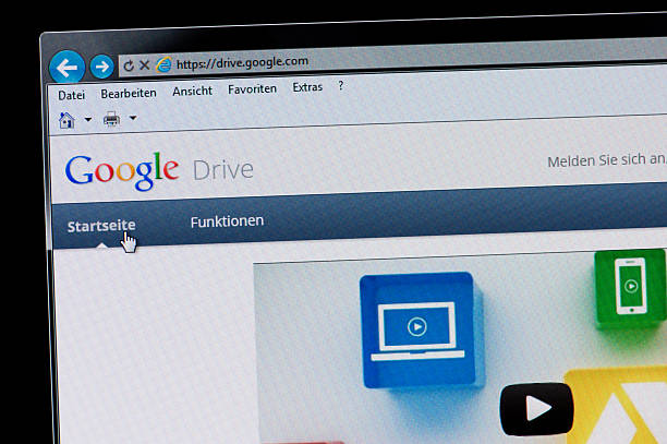 Google Drive - Macro shot of real monitor screen Essen, Germany - April 25, 2012: Part of Google Drive site in Internet Explorer browser on LCD screen. Google has opened its online drive "Google Drive". Home users and businesses to store up to five gigabytes of data for free, for a larger capacity is paid a monthly fee. Google Drive is compatible with other uses of the Internet giants closely, such as office software, Google Docs and the social Google+. The virtual drive is a key component of online services from Google. hypertext transfer protocol photos stock pictures, royalty-free photos & images