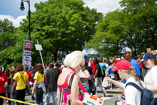 AIDS WALK 2010 NEW YORK, USA - MAY 16, 2010:People participating to the AIDS Walk 2010 walks down Riverside Drive on May 16, 2010 in New York City. aids walk stock pictures, royalty-free photos & images