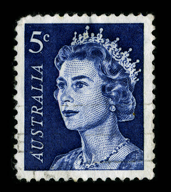 Postage stamp. "Gomel, Belarus - March 30, 2011: Postage stamp. A stamp printed in ENGLAND shows image of the Elizabeth II is the constitutional monarch of sixteen independent sovereign states known as the Commonwealth realms: the United Kingdom, Canada, Australia, New Zealand, Jamaica, Barbados, the Bahamas, Grenada, Papua New Guinea, the Solomon Islands, Tuvalu, Saint Lucia, Saint Vincent and the Grenadines, Belize, Antigua and Barbuda, and Saint Kitts and Nevis, circa 1960." elizabeth ii photos stock pictures, royalty-free photos & images