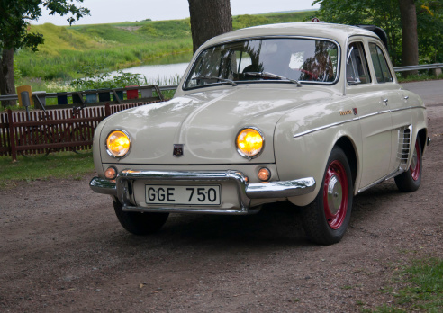 An Opel Rekord P1 (from 1950s) is parked in parking spot near Tapolca, Hungary on a sunny day