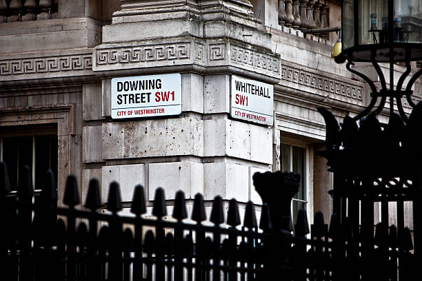 Downing Street "London, England - 17th February 2012: Downing Street is the official office of the British Prime Minister." inner london stock pictures, royalty-free photos & images