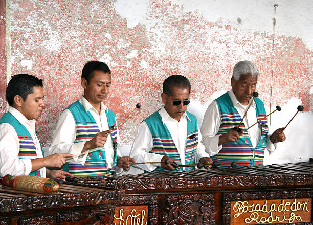 Group of marimba players performing in Antigua, Guatemala stock photo
