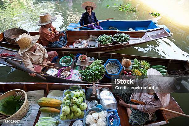 Fruit Vendors At Damnoen Saduak Floating Market Thailand Stock Photo - Download Image Now