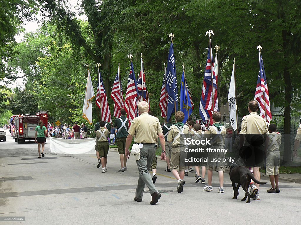 Boy Scouts marching in Fourth of July parade "Winnetka, Illinois, USA - July 4, 2007: A troop of Boy Scouts marches in a Fourth of July parade." Boy Scout Stock Photo