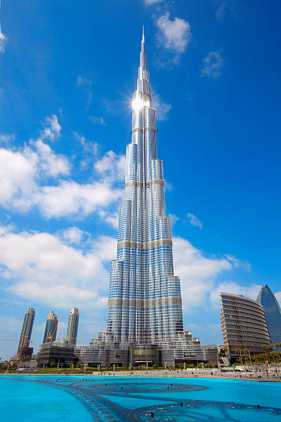 Burj Khalifa "DUBAI, UAE - FEBRUARY 19, 2011: Burj Khalifa facade on February 19, 2011 in Dubai, UAE. Burj Khalifa is a tallest building in the world, at 828m. Located on Downtown Dubai, Sheikh Zayed Road." burj khalifa photos stock pictures, royalty-free photos & images