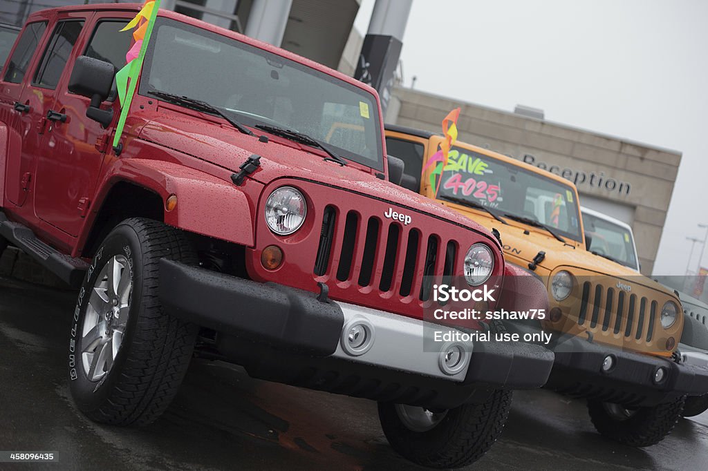 2012 Jeeps "Halifax, Nova Scotia Canada - April 22, 2012: New Jeep SUVs in a line at a Jeep dealership on a rainy spring day in Halifax, Nova Scotia, Canada" 2012 Stock Photo