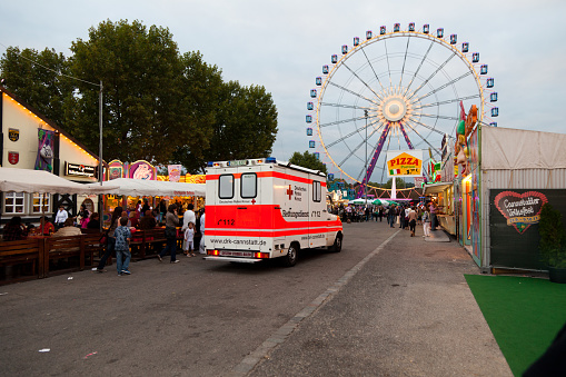 22 July 2022, Dusseldorf, Germany: An amusement fair and many eateries at a traditional festival on the banks of the Rhine river in Dusseldorf