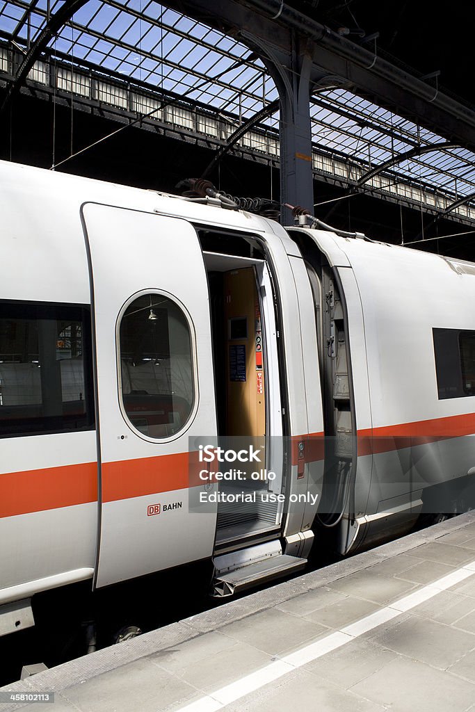 Waiting ICE train, open doors "Wiesbaden, Germany - June 2, 2011: An ICE train with open doors ist waiting for its departure at main station Wiesbaden, Germany. ICE, formerly known as InterCityExpress is a highspeed train system in Germany. Deutsche Bahn AG (DB) is a national railway company in Germany and headquartered in Berlin. DB is the successor to the former state railways of Germany (Deutsche Bundesbahn)" ICE Train Stock Photo