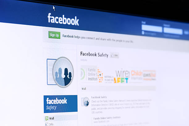 Facebook safety page on computer screen. Shallow DOF. stock photo
