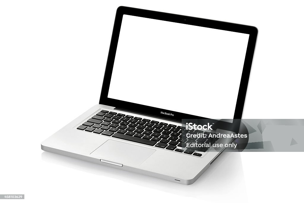 Apple laptop Mac Book Pro "Milan, Italy - February 8, 2011: Apple Mac Book Pro 13\"" on white background, silver laptop, lateral view" Beauty Stock Photo