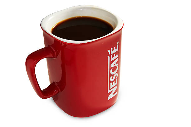 nescafe red cup - nestle stock-fotos und bilder