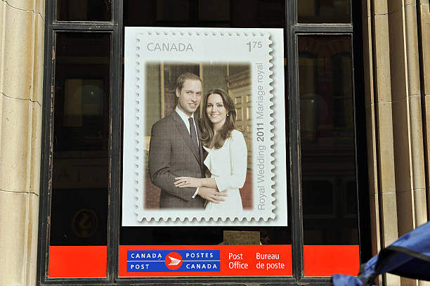 Poster of Royal Couple stamp "Ontario, Canada - July 1, 2011:  Postage Stamp poster on display in Canada Post Office window.  It commemorates the Royal wedding of Prince William and Kate Middleton who were visiting Ottawa that day for Canada Day celebrations." duchess photos stock pictures, royalty-free photos & images