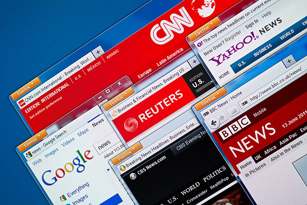 Hot News Web Sites "Kiev, Ukraine - June 13, 2011: Top news web sites - CNN, Google News, Reuters, Yahoo News, BBC and CBS News in Firefox browsers on a computer screen. These news web sites the most visited and popular in the world." brand name photos stock pictures, royalty-free photos & images