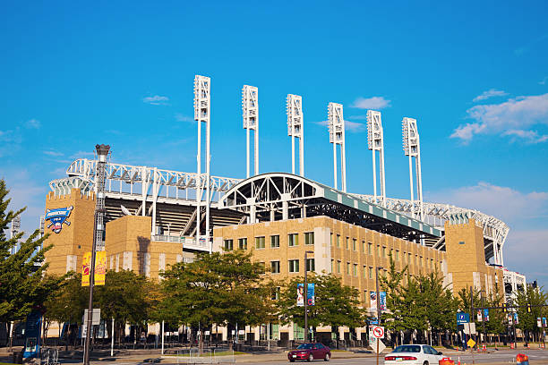 Progressive Field "Cleveland, Ohio, USA - August, 21 2012: Progressive Field stadium in the center of Cleveland. The stadium was opened in 1992 and is home to Cleveland Indians - baseball team from the Central Division of American Baseball League. The stadium currently has the capacity of 43000 people. Seen during summer afternoon." american league baseball stock pictures, royalty-free photos & images