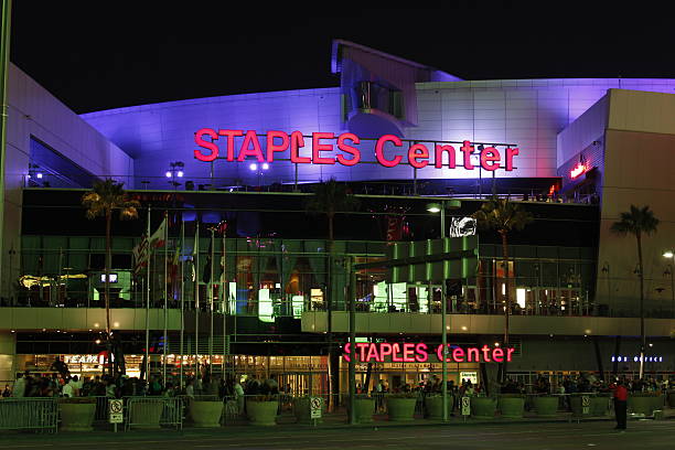 Staples Center "Los Angeles, CA, USA - August 20, 2012: A crowd of people gather outside the Staples Center after an event in downtown Los Angeles. Staples Center contains stadium seating for 14,000 people and houses world class sports teams such as the Los Angeles Lakers and Los Angeles Clippers." los angeles kings stock pictures, royalty-free photos & images