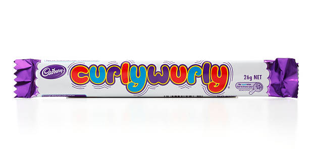 Cadbury Curly Wurly "Penrith, Australia, February 23, 2011:  A Curly Wurly chocolate bar manufactured by Cadbury." cadbury plc photos stock pictures, royalty-free photos & images